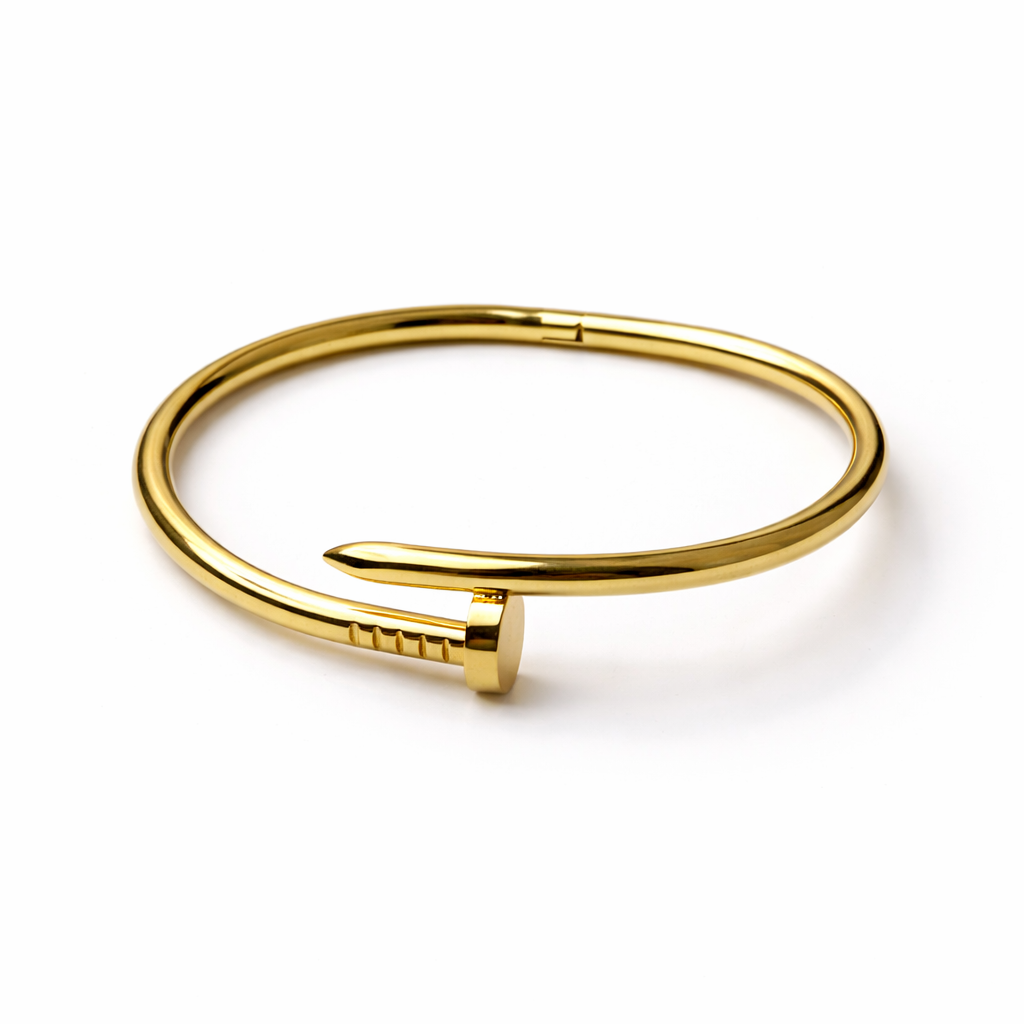 Gold bracelet on a white background
